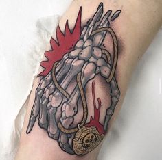 a man's arm with a tattoo on it