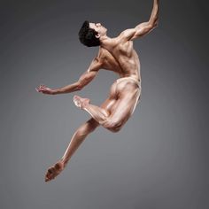 a male ballet dancer in the air