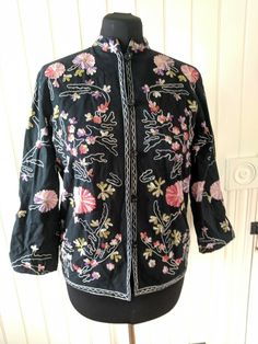 Take Two Sz S Embroidered Button Up Jacket Shirt Black 100% Cotton runs larger . Condition is Pre-owned very good. Please refer to photos to see details and examples of condition. Casual Embroidered Top With Stand Collar, Fall Embroidered Top With Stand Collar, Embroidered Stand Collar Top For Fall, Fall Floral Embroidery Tops With Stand Collar, Winter Embroidered Button-up Tops, Casual Outerwear With Floral Embroidery And Stand Collar, Embroidered Collared Winter Tops, Casual Long Sleeve Outerwear With Machine Embroidery, Cotton Outerwear With Floral Embroidery And Stand Collar