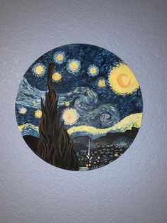 a painting on a wall with the starry night in the background