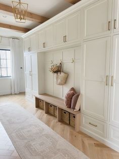 White And Gold Mudroom, Mudroom Side Entrance, Laundry Room White Oak Cabinets, Mudroom In Family Room, White And Wood Mudroom, Marble Mudroom, Mudroom Family Room Combo, Mud Room Hallway Ideas, French Country Mudroom Ideas