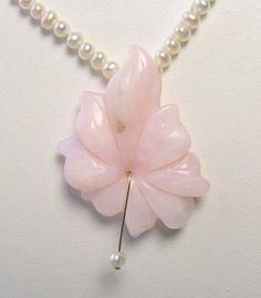 "LOVE GEMMY PINK PERUVIAN OPAL FLOWER Necklace! This is for one 16\" LOVELY Hand strung PINK PERUVIAN OPAL & Freshwater Pearl Necklace!! This natural pink Peruvian opal has been hand carved into a stunning flower and strung & knotted on silk thread for extra durability. PINK PERUVIAN OPAL speaks of the wonderful gentle side of the Divine Feminine. Opal is an overall chakra tuner! Get a boost to your pink energy with this unusual beauty! This necklace is finished with a vermeil toggle cla Valentine's Day Pink Flower Pendant Necklace, Pink Flower Pendant Necklace For Valentine's Day, Pink Wedding Necklace With Flower Charm, Pink Necklace With Flower Charm For Wedding, Feminine Pink Petal-shaped Jewelry, Pink Flower Shaped Necklace For Weddings, Pink Flower-shaped Necklaces For Mother's Day, Pink Flower Necklace For Mother's Day, Mother's Day Pink Flower Pendant Necklace