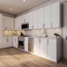 an empty kitchen with white cabinets and wood flooring is pictured in this image, there are no people around