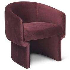 the curved chair is made out of velvet