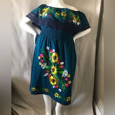 Mannequin Is A 36d / X-Large Elastic Waist Can Be Stretched A Little Bit More Can Be Worn Off Shoulders Or Off One Shoulder Hand Embroidered Made In Mexico Might Include Slight Imperfections Due To It Being Handmade Dress Pictures Is Dress You Will Receive , Only One Made Questions? Leave A Comment Below! 39 Yellow Mexican Dress, Blue Folk Style Festival Dress, Folk Style Blue Festival Dress, Traditional Blue Fiesta Dress, Blue Short Sleeve Folk Dress, Blue Fitted Folk Dress, Blue Folk Style Short Sleeve Dress, Folk Style Blue Short Sleeve Dress, Blue Folk Dress With Short Sleeves