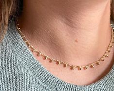 Enhance your sophisticated look with our Dots gold necklace. Crafted with gold fill for a luxurious touch, this adjustable necklace can be styled to your desired length. Elevate your style with this exclusive piece, perfect for adding an elegant touch to any outfit. Rose Gold Plated Charm Necklace, 14k Gold Filled Pendant Jewelry, Rose Gold Charm Necklace With Adjustable Chain, Fine Jewelry Rose Gold Charm Necklace With Adjustable Chain, Rose Gold Fine Jewelry Charm Necklace, Rose Gold Necklace With Delicate Chain, Rose Gold Delicate Chain Necklace Fine Jewelry, Rose Gold Fine Jewelry Necklace With Delicate Chain, Yellow Gold Pendant With Delicate Chain