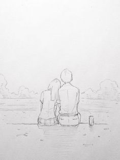 two people sitting on a bench looking out over the water