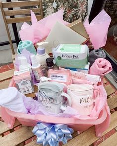 a wooden table topped with lots of personal care items