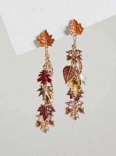 FIT Measures 0. 72” x 3. 4” . MATERIALS + CARE Base metal. Imported. . DETAILS High shine finish. Leaves drop. . The best plus size women's falling leaves statement earring earrings in gold made of other. Torrid is your destination for cozy fall and winter clothes to keep you warm and comfortable. Thanksgiving Clothes, New Street Style, Thanksgiving Celebration, Fitted Wedding Dress, Statement Earring, Falling Leaves, Earrings In Gold, Shopping Day, Accessories Jewelry Earrings