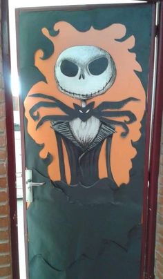 a door decorated to look like jack skellingy from the nightmare before it is painted