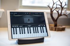 a tablet with an electronic keyboard on it