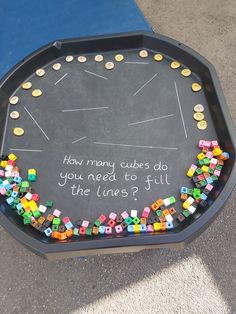 a chalkboard with words written on it that says how many cubes do you need to fill the lines?