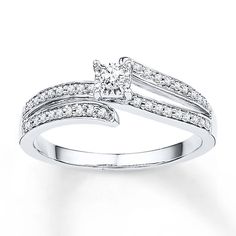 a white gold ring with diamonds on it