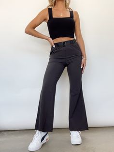 You'll be feeling chic and comfortable in Lane 201's Belted Flare Pants! These pants offer both comfort and style, what more could you ask for? These pants feature a stretchy elastic waistband, an adjustable belt, and pockets. The perfect staple piece to have on hand! Morgan is shown wearing a size small. 73% Nylon 17% Polyester 10% Spandex Hand wash cold Stretch Bottoms With Belt Loops, Versatile Stretch Bottoms With Belt Loops, Casual Stretch Belted Bottoms, Trendy Stretch Pants With Belt Loops, Black Belted Wide Leg Bottoms, Chic Stretch Belted Bottoms, Versatile Fitted Belted Bottoms, Trendy Belted Trousers, Casual Belted Bottoms For Night Out