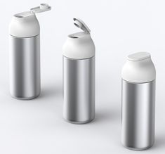 three stainless steel canisters with lids are shown in front of a white background