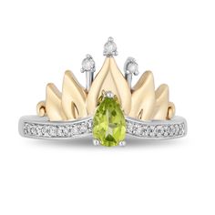 a yellow and white diamond ring with a crown on top