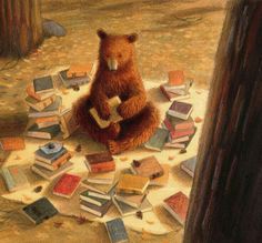 a brown bear sitting on top of a pile of books