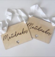 two tags with the words mathermark and love written on them next to each other