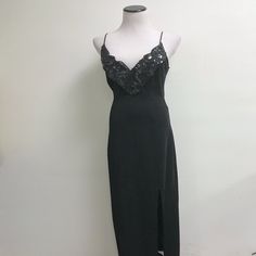 Stunning Vintage Tadashi Black Gown. Size Large. Spaghetti Straps..Rayon Nylon Blend. V Neck With Black Sequin Accents..Stretchy Back Zip... Side Slits..So Sexy! Condition: Excellent..Perfect For Party Season! Bust 16 Across At Underarm(32 Total..Unstretched..It Can Stretch Several Inches If You Need It) Waist 28 Hips 38 Length 54 From Top Of Bust To Hem Glamorous Black Evening Dress With Spaghetti Straps, Black Spaghetti Straps Evening Dress For Party, Black Spaghetti Strap Evening Gown, Black Evening Gown With Spaghetti Straps, Black Evening Dress With Spaghetti Straps For Parties, Elegant Black Floor-length Slip Dress, Black Spaghetti Strap Gown For Party, Black Spaghetti Strap Cocktail Evening Dress, Black Spaghetti Strap Evening Dress For Cocktail