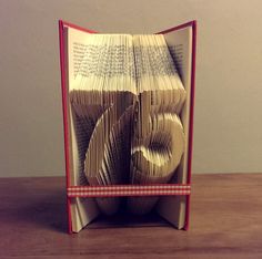 the number 75 folded book art - hand crafted original birthday gift - paper and glue