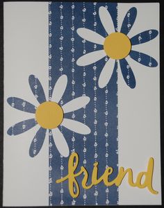 a card with flowers and the word friend on it