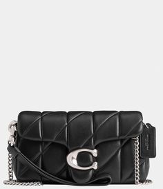 From COACH&#x2C; the Quilted Pillow Leather Tabby Wristlet features:Nappa leatherTwo credit card slotsInside multifunction pocketFold closure&#x2C; leather liningOutside open pocketDetachable wrist strapApprox. 7.25" L x 4" H x 1.5" W&#x2C; 23'' strap dropImported. Black Coach Wallet With Detachable Strap, Coach Leather Wallets With Detachable Strap, Black Leather Coach Clutch, Luxury Leather Coach Clutch, Handbag Essentials, Fashion Portfolio, Black Accessories, Pretty Bags, Quilted Pillow