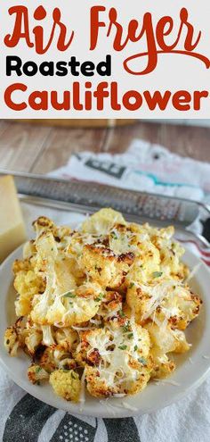 an air fryer roasted cauliflower on a plate with cheese and parmesan