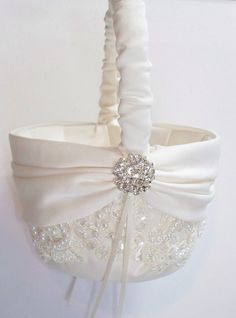 a white wedding garter with a bow on it