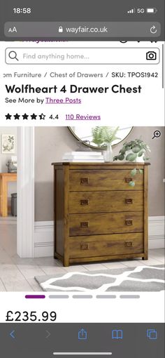 a wooden dresser sitting on top of a white floor