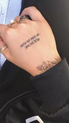 a person with a small tattoo on their left wrist and the words, i love you so much