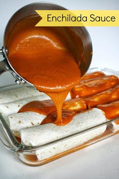 sauce being poured on top of food in a pan