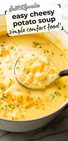 a bowl of potato soup with a spoon in it