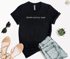 Jesus Loves You T-Shirt, Jesus Lover Christian Merch Unisex, Faith Based Apparel, Bible Verse Shirt, Aesthetic Christian Religious Clothing 🔹 SHIRT DETAILS Our Bella Canvas shirts offer you a combination of affordability, comfort, good quality and fit. Featuring side seam construction and shoulder-to-shoulder taping to help the t-shirt retain its shape. Shirts are made from soft and lightweight cotton. The solid colors are composed of 100% cotton. Heather colors combine %52 cotton and %48 polyester, to increase the shirt's lifespan. - Black designs are for white, athletic heather, mint, baby blue, yellow, orange, natural, pink and heather peach shirts; white designs are for other colored shirts. 💻 Please keep in mind that the colors may slightly differ due to monitor variations. 🔹 HOW T Happy Mind, Friends Tee, Slogan Shirts, Streetwear Mode, Text Graphic, Bold Text, Dog Lover Shirt, Motivational Quote, Shirts With Sayings