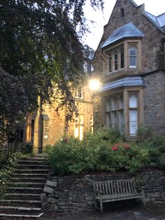 a stone building with stairs leading up to it