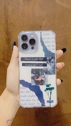 a person holding up a phone case with pictures on it