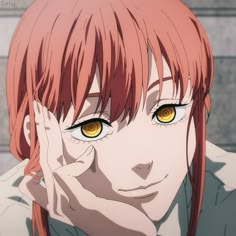 a girl with red hair and yellow eyes looks at the camera while holding her hand to her face