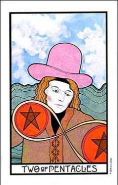 a tarot card with a woman wearing a pink hat and holding two red circles