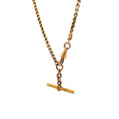 This necklace features a 15 karat yellow gold rolo chain paired with a 9 karat yellow gold toggle clasp, combining historical charm and craftsmanship. The intricate links of the rolo chain give it a distinctive look, making it perfect for layering or wearing alone as a statement piece. The toggle clasp ensures secure wear and adds an antique touch, enhancing the vintage vibe of the necklace. Ideal for those who appreciate Victorian jewelry or seek a unique addition to their collection, this piec Luxury Toggle Necklace, Heirloom Yellow Gold Chain Necklace, Formal Brass Jewelry With Cable Chain, Classic Yellow Gold Oval Link Toggle Necklace, Formal Yellow Gold Toggle Necklace With Cable Chain, Classic Rose Gold Chain Necklace With Rolo Chain, Classic Rose Gold Rolo Chain Necklace, Classic Antique Gold Chain Jewelry, Classic Toggle Necklace With Rectangular Links And Cable Chain