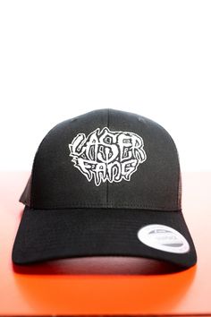 Embroidered mesh-backed trucker hat, with adjustable size.  Featuring Laserfang logo by Todd Williams.  Looking cool as heck guaranteed. York Pa, Maisie Williams, Trucker Cap, Caps Hats, Trucker Hat, Accessories Hats, Bathing Beauties, Electronic Accessories, Mesh