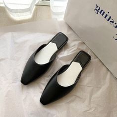 Brand Name: COZOKHeel Height: Flat (≤1cm)Shoes Type: BasicUpper Material: PUOrigin: CN(Origin)Season: SummerApplicable Place: OutsideHeel Type: Square heelOutsole Material: RubberWith Platforms: NoFit: Fits true to size, take your normal sizeInsole Material: PUModel Number: T8617138813879Fashion Element: AppliquesPattern Type: SolidLining Material: PU Trendy Black Mules For Spring, Black Flat Heel Mules For Spring, Black Flat Heel Mules For Summer, Trendy Black Closed Toe Mules, Black Slip-on Mules For Summer, Trendy Black Flat Heel Mules, Casual Black Pointed Toe Sandals, Black Flat Mules For Summer, Black Flat Mules