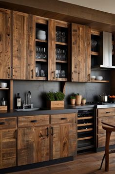 a kitchen filled with lots of wooden cabinets and counter top space next to a dining room table