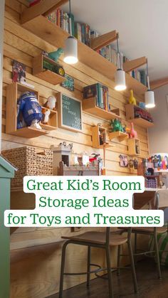 a room filled with lots of toys and books on wooden shelves next to a desk