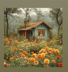 a house in the middle of a field with lots of flowers around it and trees