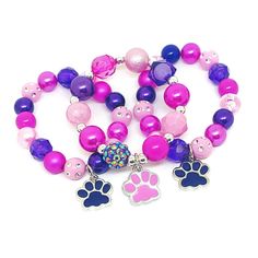 These adorable bracelets are the perfect favor for your little one's paw themed party! Each bracelet features a pink or purple enameled paw charm, resin rhinestone beads and an assortment of pink, purple and hot pink 10mm acrylic beads strung with durable stretch floss cord. Each bracelet comes individually packaged in organza bags. Please message me if you have any questions or if you would like to make some changes to this item. To be the first to know about new items, sales and giveaways, mar Nickel-free Pink Bracelets For Friendship, Personalized Pink Novelty Charm Bracelet, Playful Pink Charm Bracelet For Birthday, Adjustable Purple Charm Bracelet For Birthday, Pink Beaded Bracelets For Birthday, Hypoallergenic Pink Charm Bracelet For Friendship, Personalized Pink Novelty Stretch Bracelet, Pink Personalized Novelty Stretch Bracelet, Pink Bracelet For Party Favors