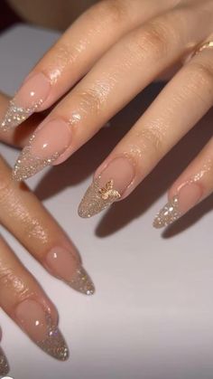 Summer Bliss: May Nail Designs to Brighten Your Days Almond Nails Glitter Tip, Holiday Almond Nails Winter, Nude And Glitter Nail Designs, Gala Nails Ideas, Acrylic Nails Glitter Tips, Prom Nails Rose Gold, Birthday Almond Nails Designs, Acrylic Nail Designs Glam, Glitter Almond Nails Designs