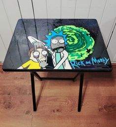 a table painted with the characters rick and mort from cartoon television show rick and mort