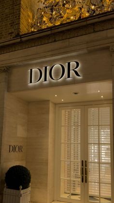 the entrance to dior's store in new york city, ny at night