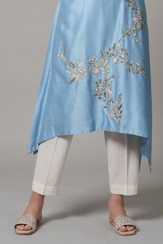 Sky blue chanderi asymmetric kurta with placement floral embroidery. Paired with a pant. - Aza Fashions Spring Salwar Kameez With Mirror Work And Traditional Drape, Traditional Spring Salwar Kameez With Mirror Work, Traditional Drape Salwar Kameez With Mirror Work For Spring, Eid Embroidered Kurta With Asymmetrical Hem, Embroidered Asymmetrical Hem Kurta For Eid, Festive Embroidered Kurta With Asymmetrical Hem, Embroidered Asymmetrical Hem Kurta For Festive Season, Asymmetric Kurta, Payal Singhal