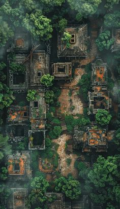 an aerial view of some buildings in the woods