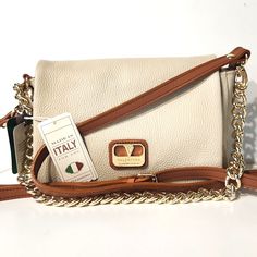 New With Tags Valentina Crossbody Shoulder Bag Purse Italian Pebbled Leather Eggshell/Brown Gold Hardware Detachable Strap Gold Chain Strap Multiple Interior Organizing Compartments Approximate Measurements 9.75" Length, 7.5" High, 3" Wide Gorgeous Durable & Classy!! Cream Leather Shoulder Bag With Chain Strap, Cream Leather Bag With Chain Strap, Skittles Bag, Gucci Leather Bag, Black Gold Chain, Bag With Chain, Black Leather Crossbody Bag, Leather Handbags Crossbody, Gucci Leather